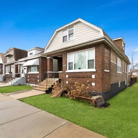Buy this 4 bed house on 9338 South Colfax Avenue in Chicago, IL 60617