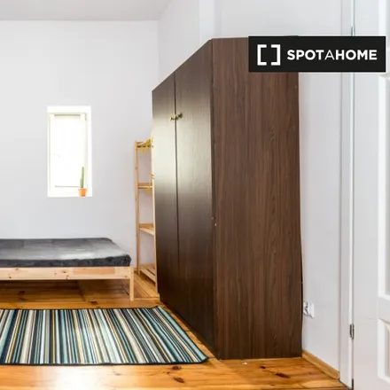 Rent this 7 bed room on Feliksa Nowowiejskiego 1 in 61-731 Poznan, Poland