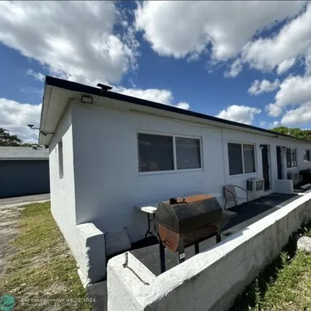 Buy this 4 bed house on 468 Northeast 33rd Street in Oakland Park, FL 33334