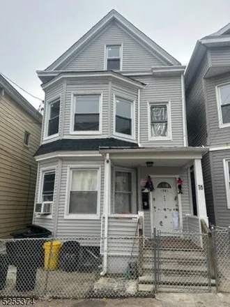 Buy this 8 bed house on 101 Clinton Street in Paterson, NJ 07522