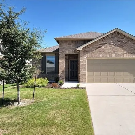 Rent this 4 bed house on 11616 Amber Stream Ln in Manor, Texas