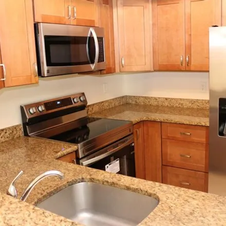 Rent this 1 bed condo on 1526 Se Royal Green Cir Apt L108 in Port Saint Lucie, Florida