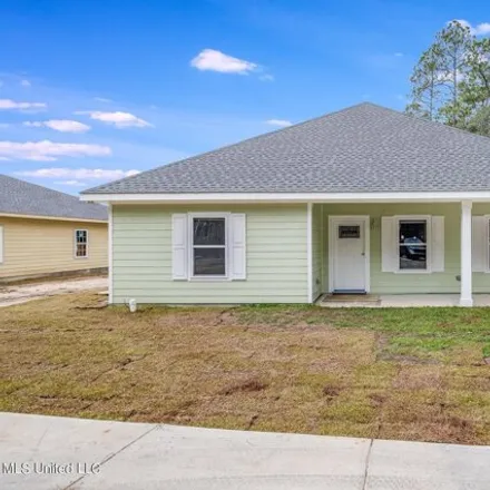 Buy this 4 bed house on 1408 Lark Drive in Gautier, MS 39553