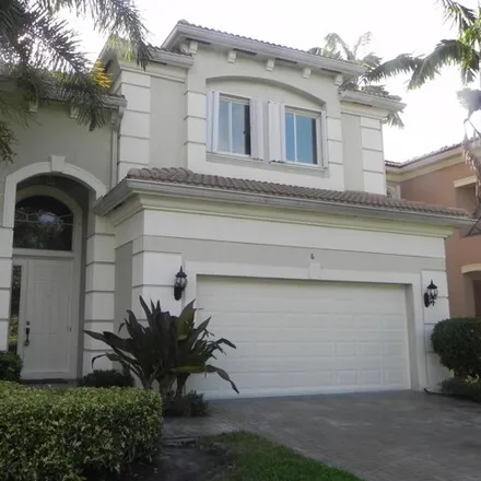 Rent this 4 bed house on 6 Country Lake Trail in Boynton Beach, FL 33436