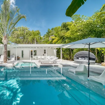 Rent this 4 bed house on 4000 Kumquat Avenue in Miami, FL 33133