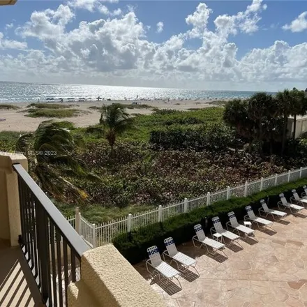Rent this 2 bed condo on Ocean Avenue in Riviera Beach, FL 33404