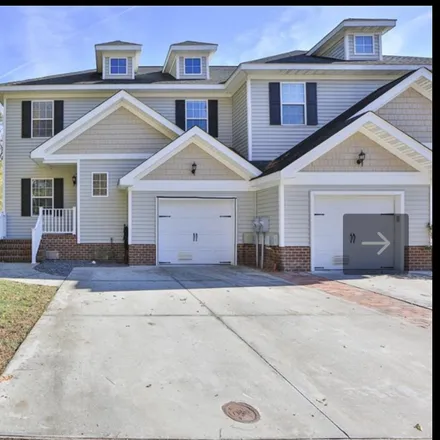Rent this 3 bed townhouse on 318 Snowberry Lane