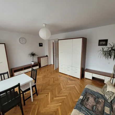 Rent this 4 bed apartment on Józefa Brodowicza 5b in 31-518 Krakow, Poland