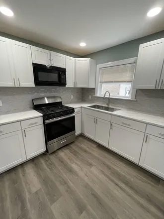 Rent this 3 bed apartment on 876 Atwells Avenue in Olneyville, Providence