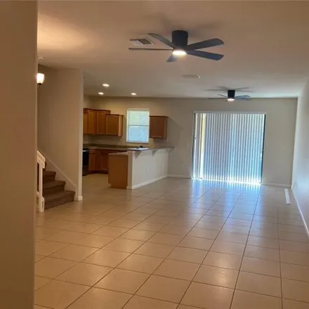 Image 2 - 1903 Portofino Meadows Boulevard, Meadow Woods, Orange County, FL 32824, USA - Townhouse for rent