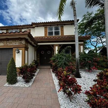 Buy this 4 bed house on 8661 Miralago Way in Parkland, FL 33076