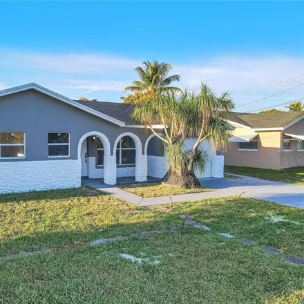 Buy this 3 bed house on 9226 Southwest 2nd Street in Sandalfoot Cove, Palm Beach County