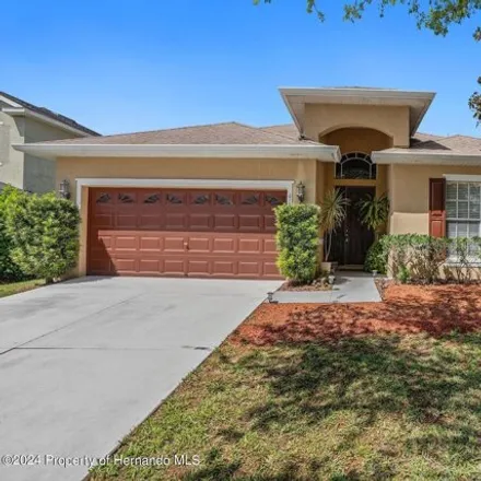 Buy this 3 bed house on 4255 Beaumont Loop in Spring Hill, FL 34609