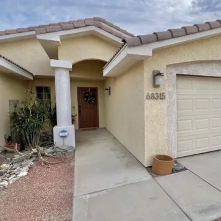 Rent this 4 bed house on 68315 Tortuga Road in Cathedral City, CA 92234