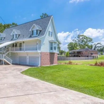 Buy this 4 bed house on 3618 Cayton Rd in Westlake, Louisiana