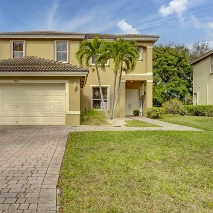 Image 2 - 4996 Victoria Circle, West Palm Beach, FL 33409, USA - House for sale