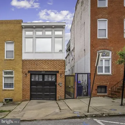 Rent this 2 bed house on 224 South Chester Street in Baltimore, MD 21231