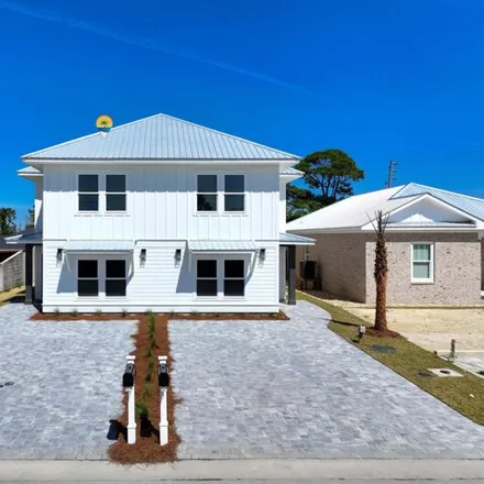 Buy this 8 bed house on 5520 Sunset Ave Unit A in Panama City Beach, Florida