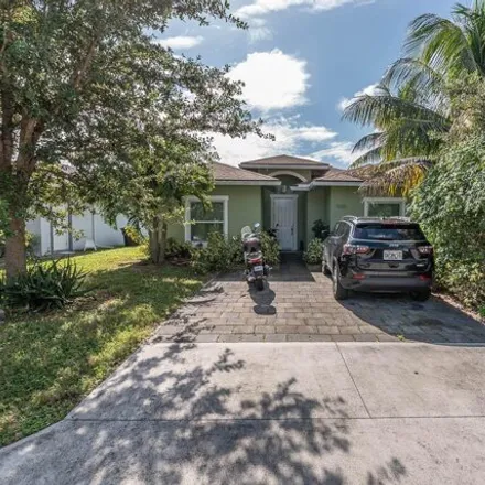 Buy this 4 bed house on 1056 Francis Street in West Palm Beach, FL 33405