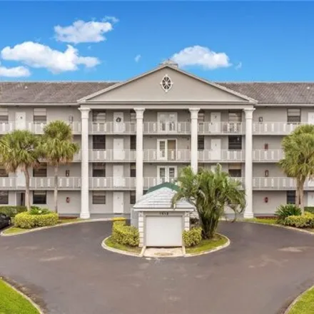 Buy this 2 bed condo on Pine Island Ridge Golf Course in Southwest 19th Court, Pine Island Ridge