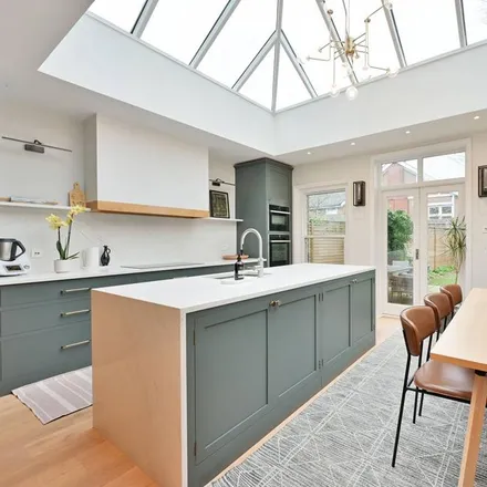 Rent this 5 bed townhouse on 28 Southdean Gardens in London, SW19 6NU