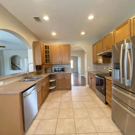 Rent this 5 bed apartment on 11209 Village Brook Drive in Riverview, FL 33569