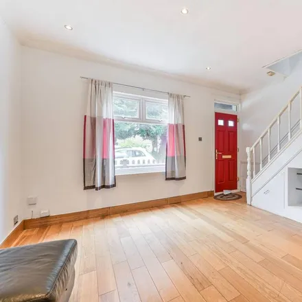 Rent this 3 bed townhouse on Palestine Grove in London, SW19 2QN