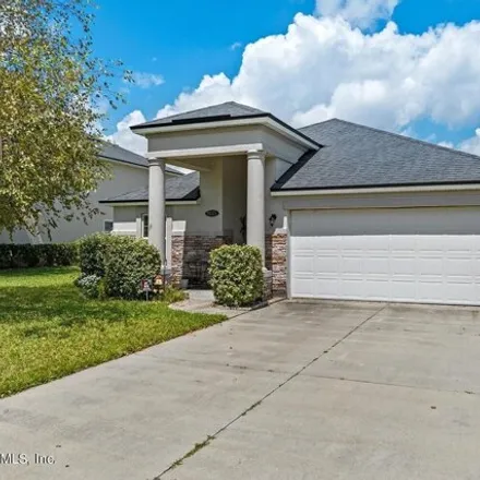 Buy this 4 bed house on 85369 Amaryllis Court in Nassau County, FL 32034