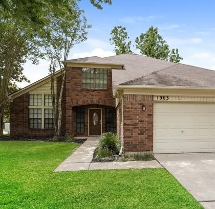 Rent this 4 bed house on 1903 Brazos Crossing Dr in Richmond, Texas