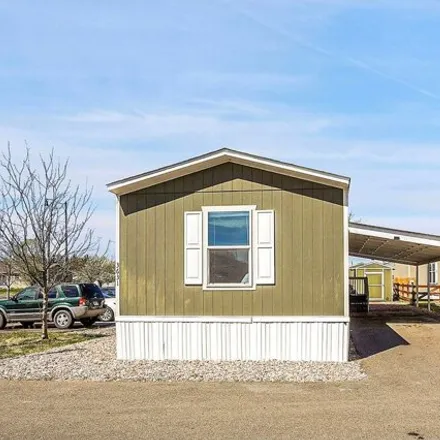 Buy this studio apartment on 299 37th Street in Evans, CO 80620