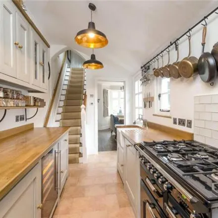 Buy this 1 bed townhouse on Belvedere Square in London, SW19 5DJ