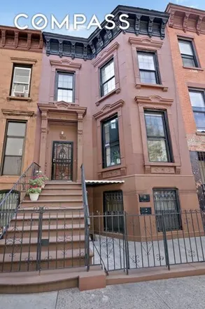 Buy this 5 bed townhouse on 900 Lafayette Avenue in New York, NY 11221