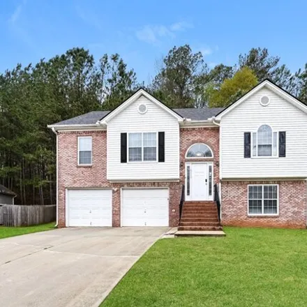 Buy this 5 bed house on Mystery Valley Golf Club in 6094 Shadow Rock Drive, Lithonia