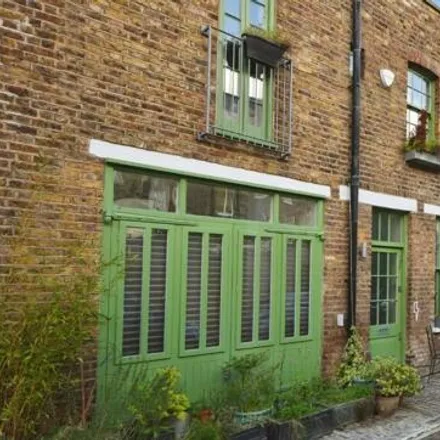 Buy this 3 bed townhouse on 7 Railey Mews in London, NW5 2NX