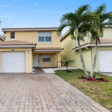 Buy this 3 bed house on 6688 Duval Ave in West Palm Beach, Florida