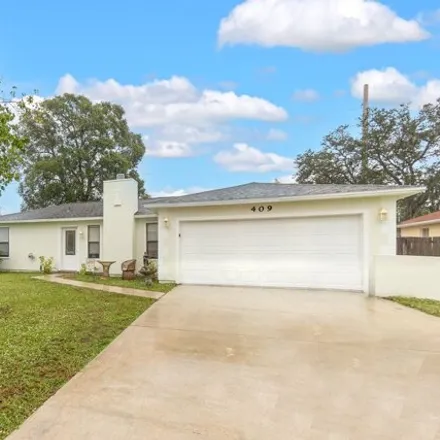 Buy this 3 bed house on 415 Minor Avenue Northeast in Palm Bay, FL 32907