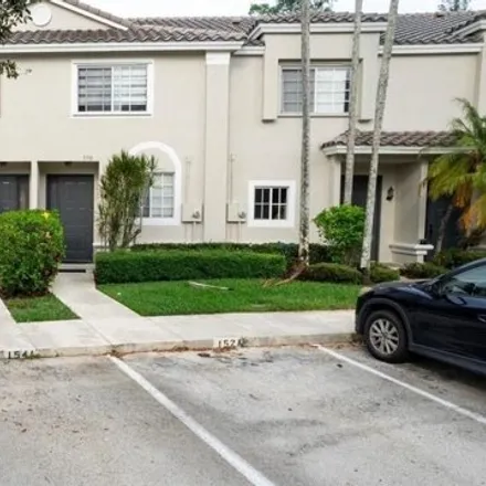 Buy this 2 bed townhouse on 5768 Northwest 48th Avenue in Coconut Creek, FL 33073