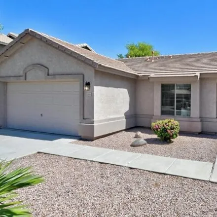Rent this 3 bed house on 15041 West Riviera Drive in Surprise, AZ 85379