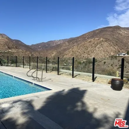 Rent this 2 bed townhouse on 6212 Tapia Drive in Malibu West, Malibu