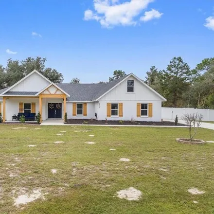 Buy this 4 bed house on 5836 Southwest 172nd Loop in Marion County, FL 34473