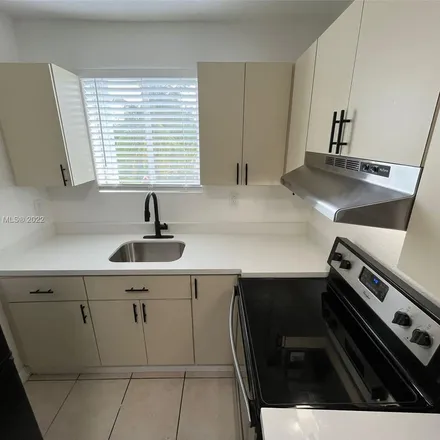 Rent this 2 bed apartment on 120 Northeast 55th Street in Bayshore, Miami