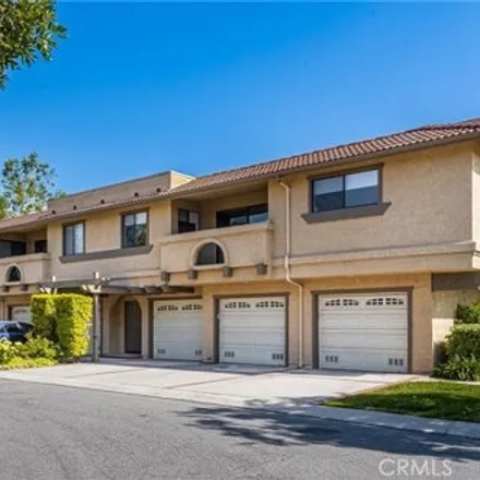 Buy this 2 bed condo on 25193 Oak Canyon Lane in Serrano Place, Lake Forest