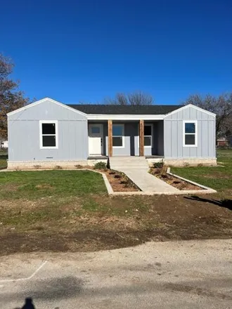 Buy this 3 bed house on 1076 East Spring Street in Henrietta, TX 76365