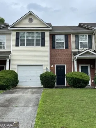 Rent this 3 bed townhouse on 8456 Kaden Drive in Clayton County, GA 30238