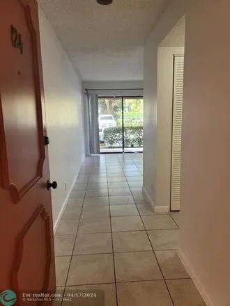 Rent this 1 bed condo on 3103 Riverside Drive in Coral Springs, FL 33065