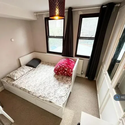 Rent this 3 bed townhouse on 66 Henfield Road in London, SW19 3HH