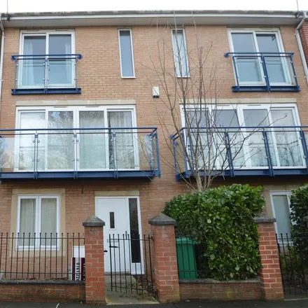 Rent this 3 bed townhouse on 22 The Sanctuary in Manchester, M15 5TR