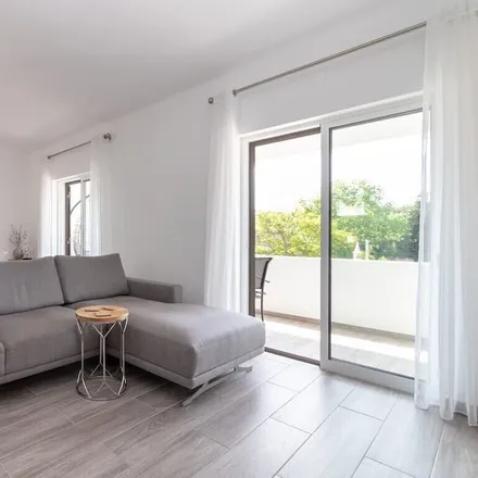 Rent this 2 bed townhouse on Lagoa e Carvoeiro in Faro, Portugal