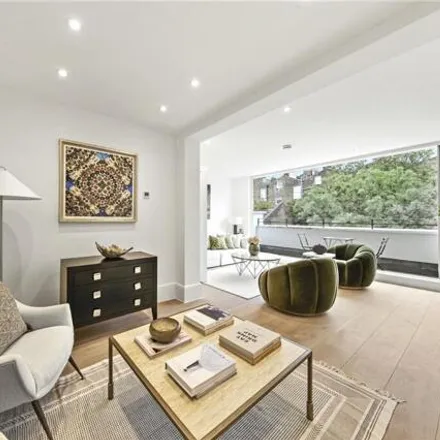 Buy this 3 bed townhouse on 44 St Luke's Mews in London, W11 1DG