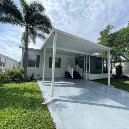 Buy this studio apartment on 6468 Colonial Drive in Margate, FL 33063